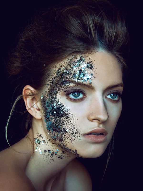 Blonde female model with silver glitter makeup by Nika Vaughan